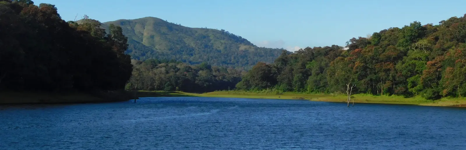 kerala-mountain-backwater-bike-ride-kochi-munnar-vagamon-thekkady-alapuzha-south-trek-hero.webp